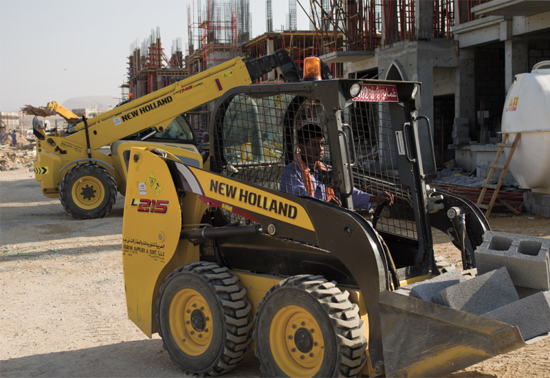 New Holland machines in use on a construction site in Muscat. New Holland machines in use on a construction site in Muscat.