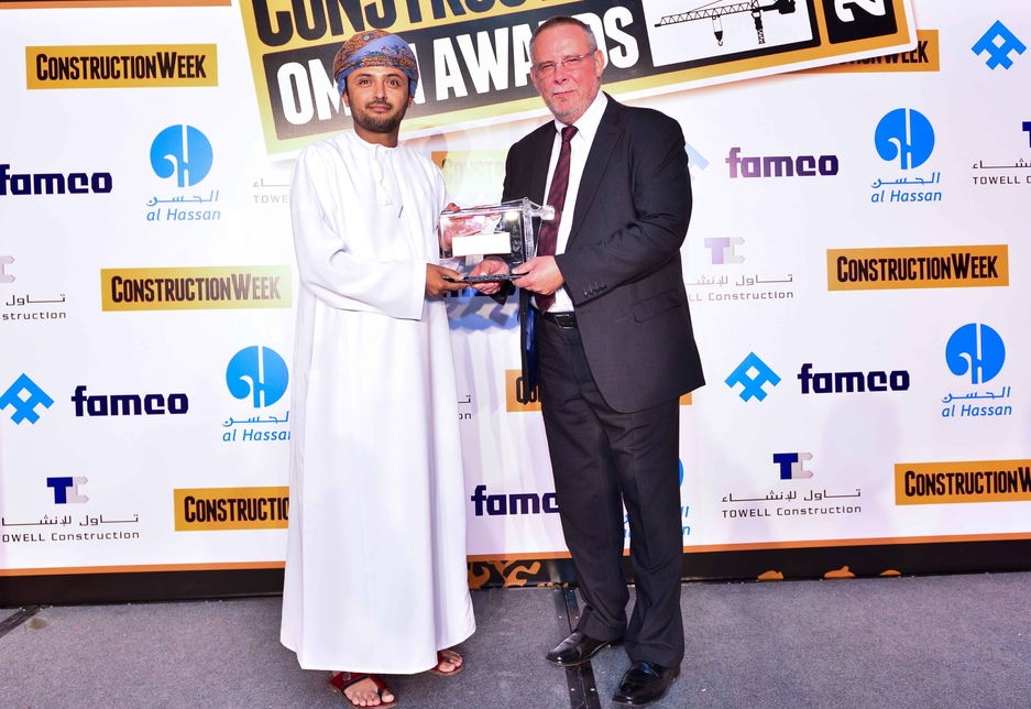 Muhammad Sultan Al Salmy (l) receives the Commercial Project of the Year Award from Peter Hall of Al Hassan. Muhammad Sultan Al Salmy (l) receives the Commercial Project of the Year Award from Peter Hall of Al Hassan.