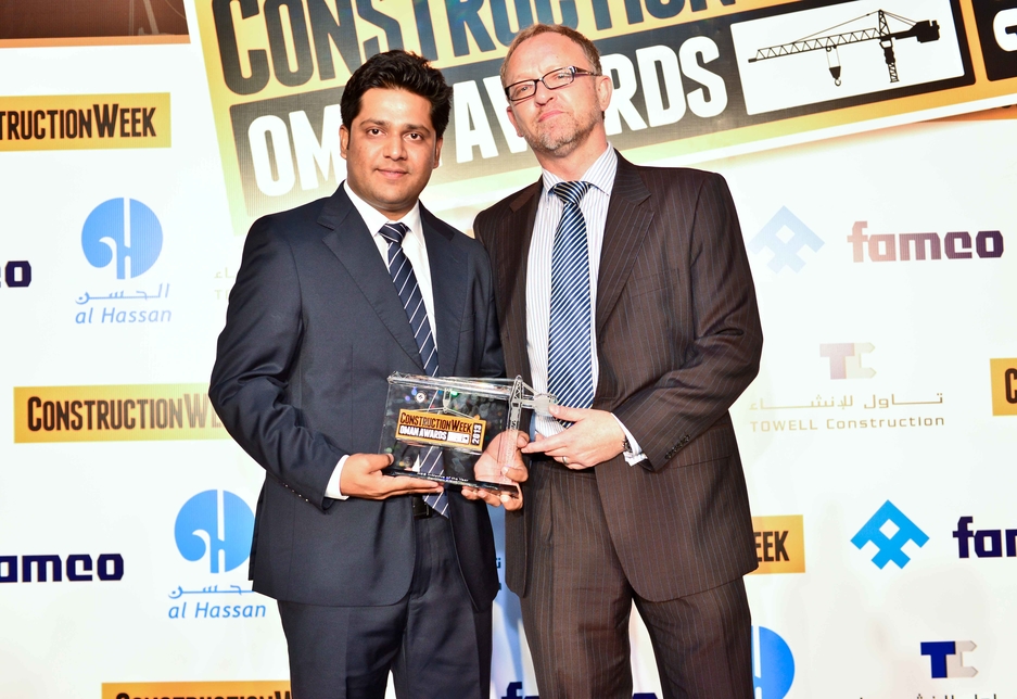 Ankur Bhuria, regional HSE manager, collected the HSE award from Construction Week's Gary Wright. Ankur Bhuria, regional HSE manager, collected the HSE award from Construction Week's Gary Wright.