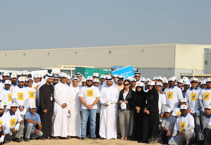 Imdaad CEO Jamal Lootah (centre) with the staff that conducted the clean-up. Imdaad CEO Jamal Lootah (centre) with the staff that conducted the clean-up.