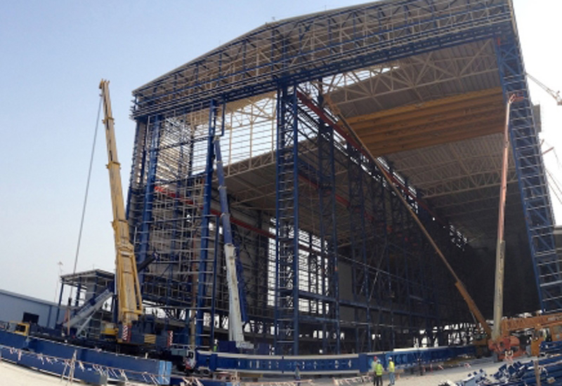 The 68-tonnes doors are the tallest the firm has constructed in its 29-year history. The 68-tonnes doors are the tallest the firm has constructed in its 29-year history.