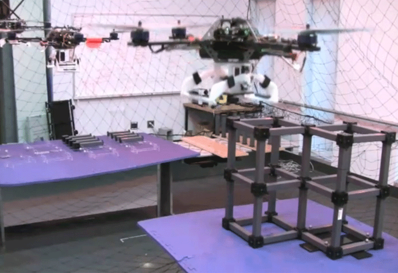 A screen grab from an online video of the robots working. A screen grab from an online video of the robots working.