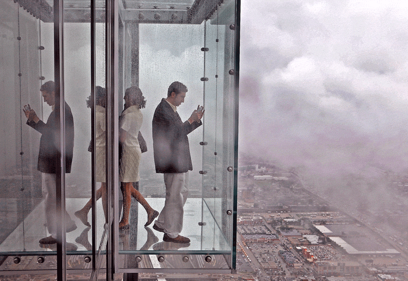 The Willis Tower's new glass observation cubicles - for the brave. Photo: Getty. The Willis Tower's new glass observation cubicles - for the brave. Photo: Getty.