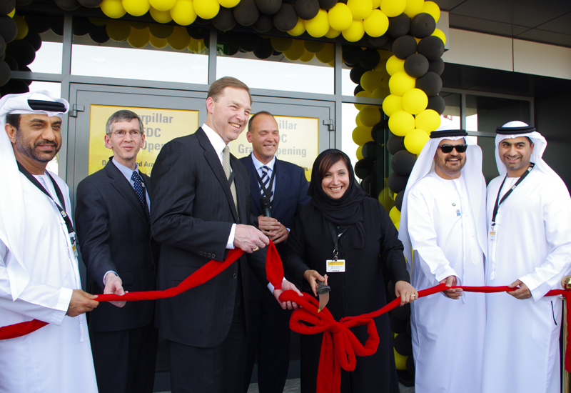 The ribbon was cut by Stu Levenick, Cat group president, and HE Salma Ali Saif Bin Hareb, CEO of Economic Zones World and Jafza. The ribbon was cut by Stu Levenick, Cat group president, and HE Salma Ali Saif Bin Hareb, CEO of Economic Zones World and Jafza.