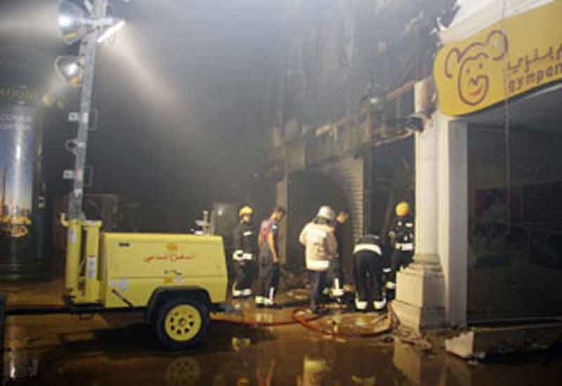 Qatar Civil Defense personnel work in the aftermath of the blaze (source: MOI). Qatar Civil Defense personnel work in the aftermath of the blaze (source: MOI).