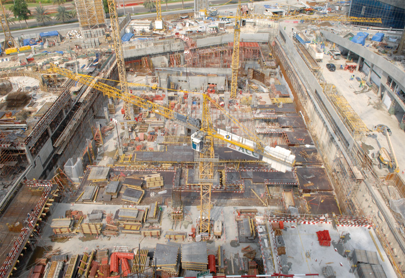 At this stage of construction, the project can be divided into two parts. The first is the area in which the circular podium for the main tower stands At this stage of construction, the project can be divided into two parts. The first is the area in which the circular podium for the main tower stands