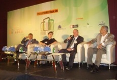 Experts debate the isssues at a sustainability event. Experts debate the isssues at a sustainability event.