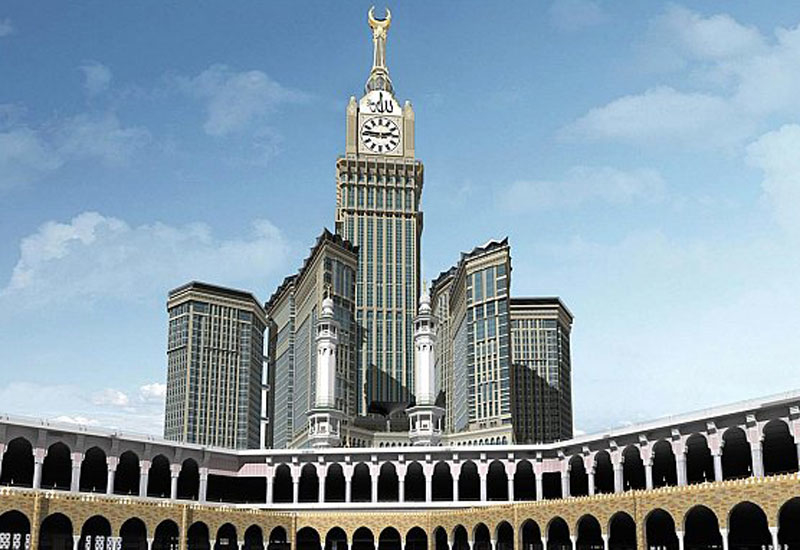 The under construction Mecca Royal Clock Tower hotel complex in the holy Saudi city of Mecca is being built by the Saudi Binladin Group. The under construction Mecca Royal Clock Tower hotel complex in the holy Saudi city of Mecca is being built by the Saudi Binladin Group.