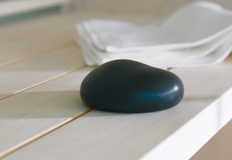 The Inipi sauna's control unit is shaped like a stone. The Inipi sauna's control unit is shaped like a stone.