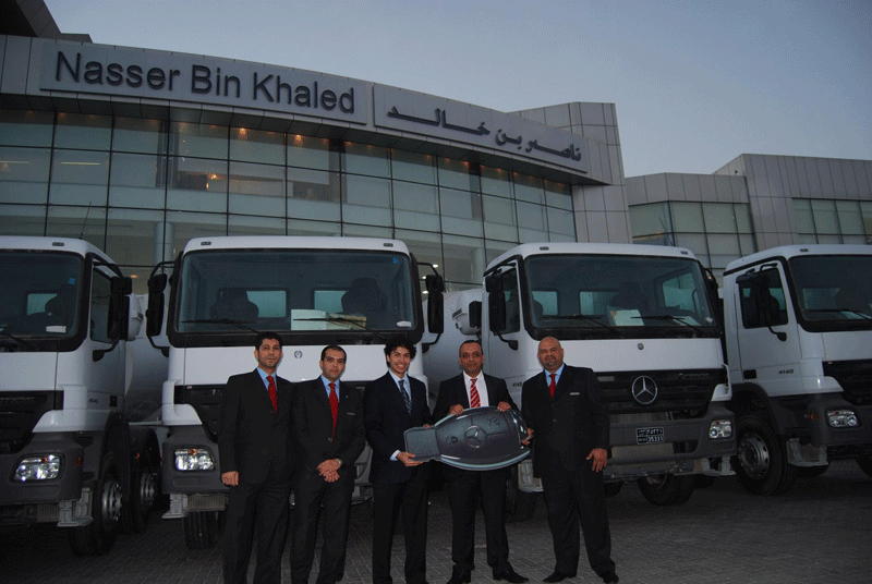 The NBK Autos and Redco teams shake on the deal. The NBK Autos and Redco teams shake on the deal.