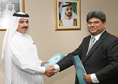 EHS CEO Ahmed Abdul Hussain (left) and Pacific Controls Systems CEO Dilip Rahulan. EHS CEO Ahmed Abdul Hussain (left) and Pacific Controls Systems CEO Dilip Rahulan.
