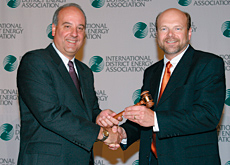 Rugel (left) passes the gavel to RMF's Smith. Rugel (left) passes the gavel to RMF's Smith.