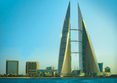 Located in the Manama business district, the Bahrain World Trade Centre comprises two 50-storey mixed-use towers. Three wind turbines are expected to Located in the Manama business district, the Bahrain World Trade Centre comprises two 50-storey mixed-use towers. Three wind turbines are expected to