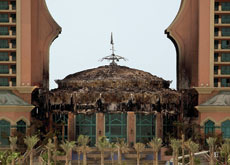 The dome roof of the lobby area of the Atlantis Hotel on Palm Jumeirah was destroyed by a fire just weeks before its opening. The dome roof of the lobby area of the Atlantis Hotel on Palm Jumeirah was destroyed by a fire just weeks before its opening.
