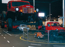 POWER TRIP: Giant replica truck dwarves the Datsun under the front axle. The attention to detail can be seen when comparing it to the real Power Wagon POWER TRIP: Giant replica truck dwarves the Datsun under the front axle. The attention to detail can be seen when comparing it to the real Power Wagon