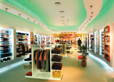 A predominently white scheme by Deco is brightened by the use of coloured uplighters. A predominently white scheme by Deco is brightened by the use of coloured uplighters.