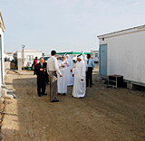 Members of the fledgling committee to oversee health and environmental affairs in labour camps visit temporary worker accommodation in Dubai. Members of the fledgling committee to oversee health and environmental affairs in labour camps visit temporary worker accommodation in Dubai.