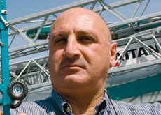 TOY CRANE SET: Jehad Jadou uses a model to demonstrate how the new-style tower crane unfolds. TOY CRANE SET: Jehad Jadou uses a model to demonstrate how the new-style tower crane unfolds.
