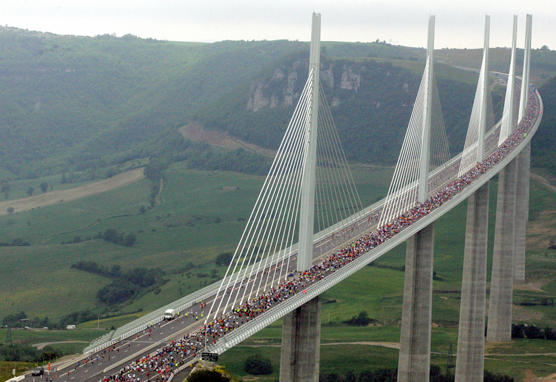 Competitors take part in the 'Viaduc' race, on the Millau viaduct, the world's tallest bridge (ERIC CABANIS/AFP/Getty Images). Competitors take part in the 'Viaduc' race, on the Millau viaduct, the world's tallest bridge (ERIC CABANIS/AFP/Getty Images).