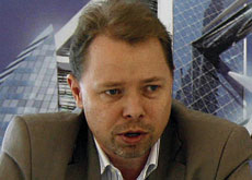 Norwin's Ole Sangill at the launch of the Bahrain World Trade Centre wind turbines. Norwin's Ole Sangill at the launch of the Bahrain World Trade Centre wind turbines.
