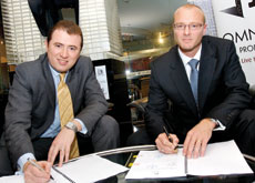 DEAL IS DONE: Mehdi Amjad signs the contract with Graeme Robson of Nasa Multiplex. DEAL IS DONE: Mehdi Amjad signs the contract with Graeme Robson of Nasa Multiplex.