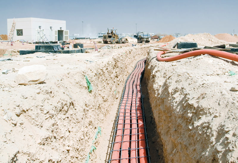 The optic fibre cable is enclosed in a high strength corrugated plastic pipe before being encased in concrete to ensure its longevity. The optic fibre cable is enclosed in a high strength corrugated plastic pipe before being encased in concrete to ensure its longevity.