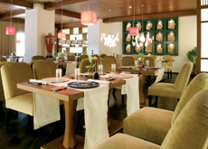 Timber is used to create a warm atmosphere in the restaurant. Timber is used to create a warm atmosphere in the restaurant.