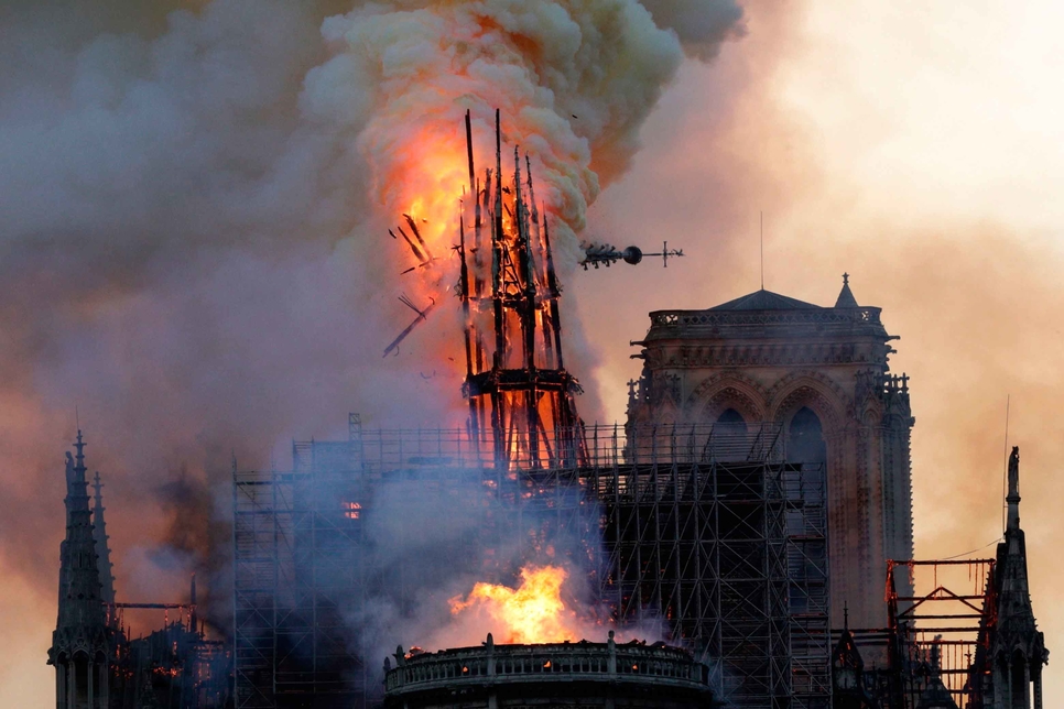 Notre-Dame de Paris's spire moments before its collapse. Notre-Dame de Paris's spire moments before its collapse.