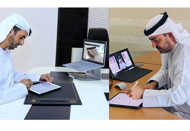 DLD's HE Juma bin Humaidan (left) and Amlak Finance's Arif Alharmi Albastaki signing the agreement DLD's HE Juma bin Humaidan (left) and Amlak Finance's Arif Alharmi Albastaki signing the agreement